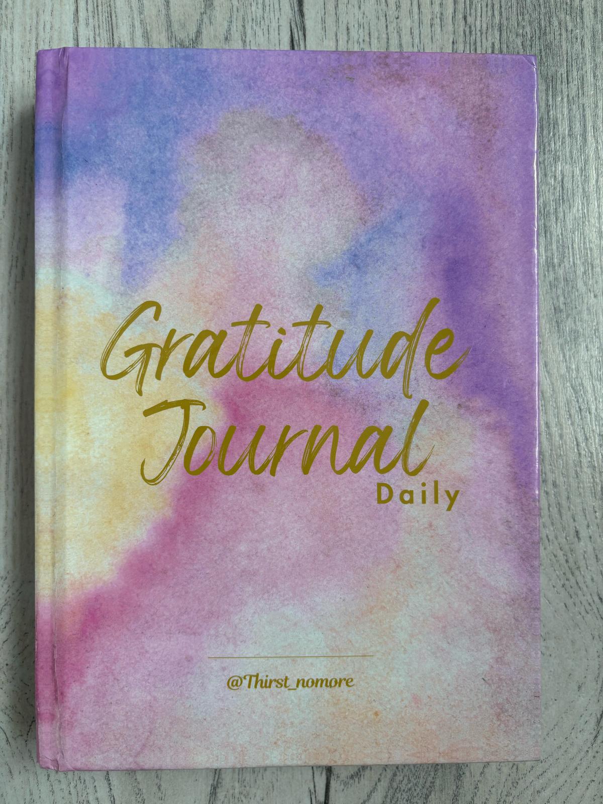 hardback undated daily gratitude journal in the colour Easter Pink