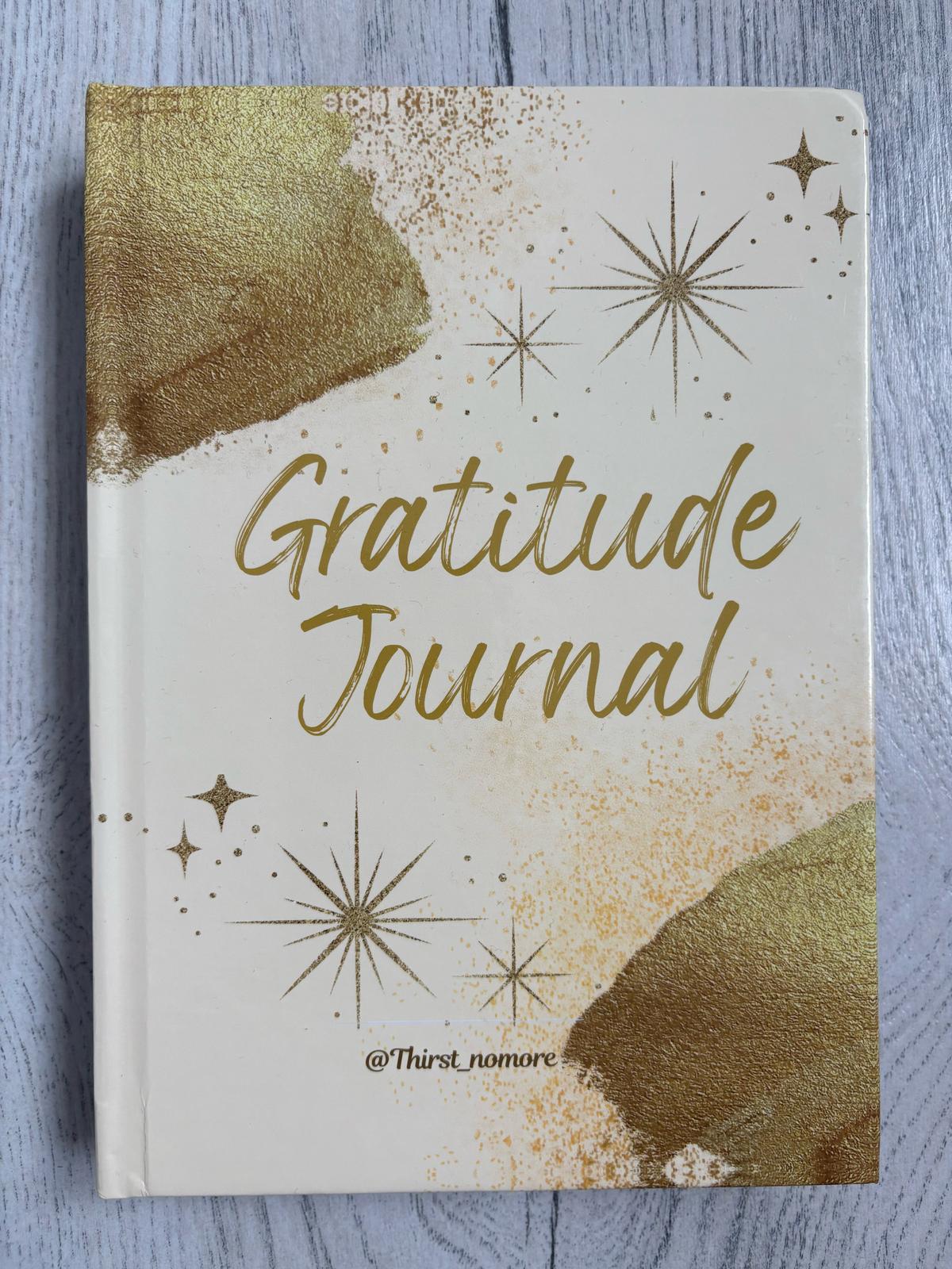 hardback undated gratitude journal in the colour Festive Gold